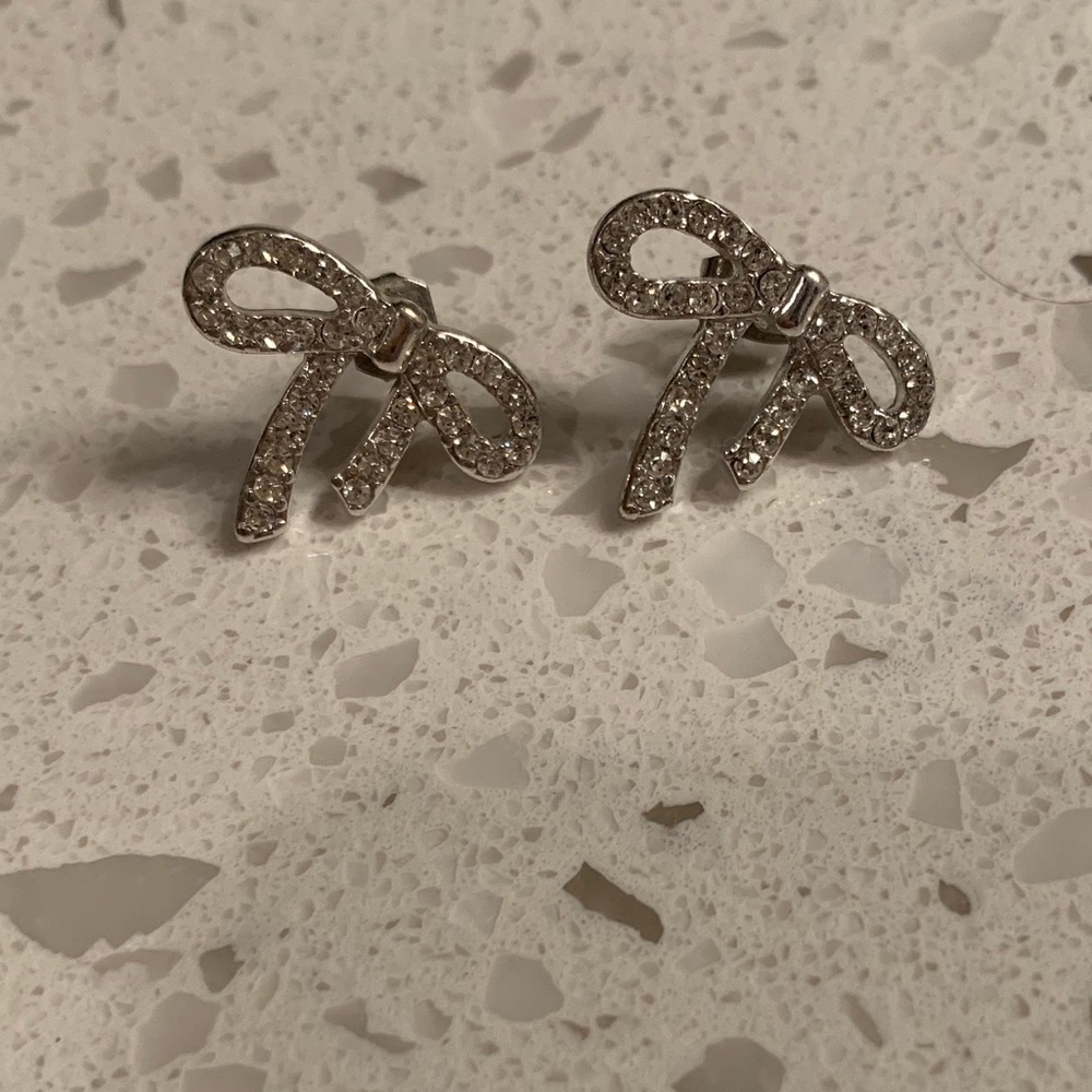 Rhinestone bow silver stud earrings